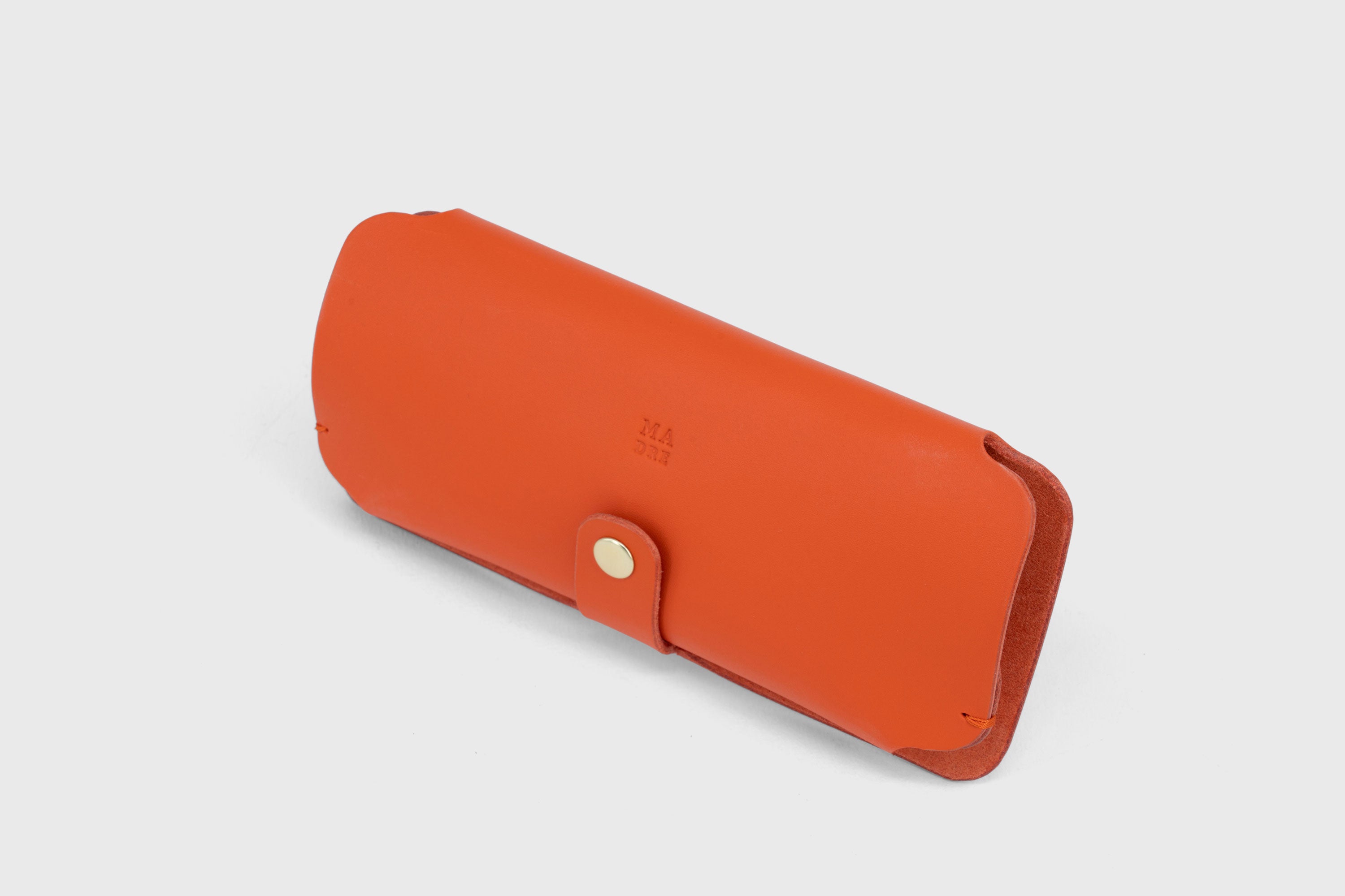 Glasses and Sunglasses Case Sleeve Orange Leather Minimalistic Design Premium Quality Vegetable Tanned Leather Atelier Madre Manuel Dreesmann Barcelona Spain